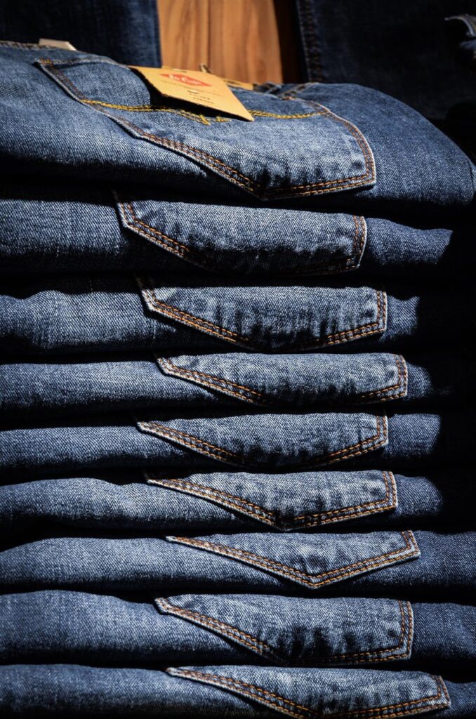 stacked blue jeans